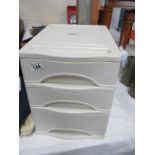 A small 3 drawer plastic file box and a case