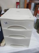 A small 3 drawer plastic file box and a case