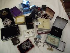 A mixed lot of costume jewellery including pendants, earrings etc.