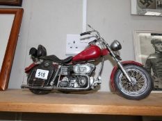 A large pressed metal model of a Harley Davidson/Indian motorcycle.
