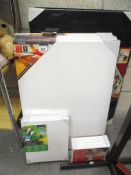 A quantity of new canvas on wooden frames, puzzlemate etc.