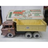 A boxed Marx Powerhouse pressed steel scissor action hydraulic dump truck.