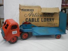 A 1950/60's pressed steel articulated cable lorry made by Christie & Jay Ltd.