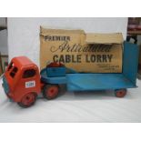 A 1950/60's pressed steel articulated cable lorry made by Christie & Jay Ltd.