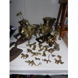 A quantity of brass and metal ware including carriage set, shoe last, flat irons etc.