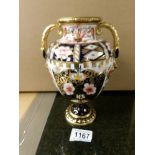 A Royal Crown Derby two handled vase, missing lid.