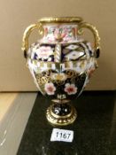 A Royal Crown Derby two handled vase, missing lid.