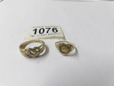 A gold St. Christopher ring, size J and a gold knot ring, size Q. 3.6 grams.