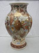 A large Japanese Satsuma vase, damage to base but complete. 47 cm. (collect only).