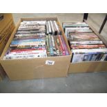 A box of assorted DVD's.