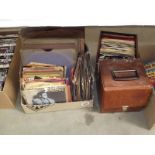 A quantity of 45 rpm and 78 rpm records.