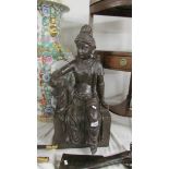 A large bronzed resin figure of an Indian female - hight 68cm. (collect only).