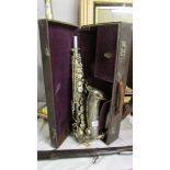 A cased Buffet saxaphone.