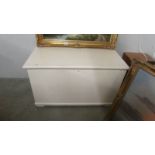 A painted pine Victorian blanket box with candle box and secret drawer.