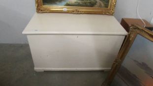 A painted pine Victorian blanket box with candle box and secret drawer.