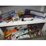 A large quantity of unboxed plastic and die cast toy vehicles including Match box, Yesteryear etc.