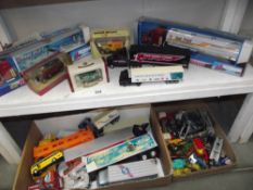 A large quantity of unboxed plastic and die cast toy vehicles including Match box, Yesteryear etc.