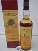 An unopened bottle of Glenmorangie Millenium malt whisky.