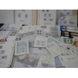 A large quantity of albums, packets of stamps, miniature sheets relating to Royal events etc.