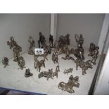 A mixed lot of silver plate figures and animals.