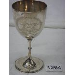 A good clean hall marked silver chalice with engraving of dog, 14 cm tall, 113 grams.