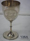 A good clean hall marked silver chalice with engraving of dog, 14 cm tall, 113 grams.