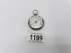 A hall marked silver fob watch.