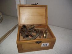 A cased brass Kelvin & Hughes sextant and compass.