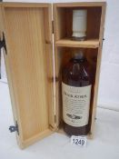 A sealed boxed Blair Athol whisky and a Grants whisky.