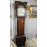 An oak cased long case painted dial clock marked Jn. Bolton, Chesterfield.
