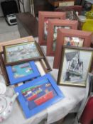 A quantity of framed and glazed prints