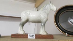 A Beswick Grey shire horse.