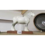 A Beswick Grey shire horse.