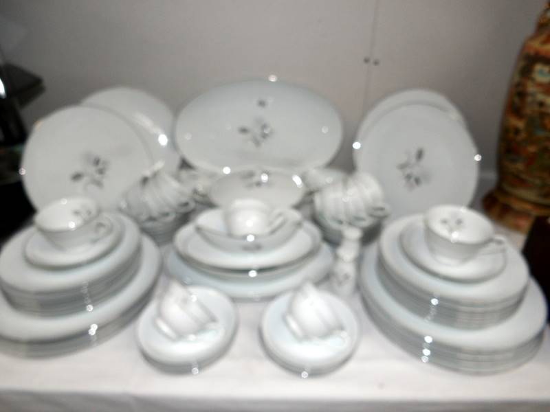 In excess of 60 pieces of Japanese tea and dinner ware marked R C on base. (collect only).