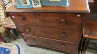 A mahogany 3 drawer chest.