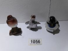 A Beswick robin, a Goebel tit and a Danish bird.