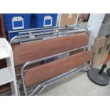 A chrome metal bedstead