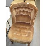 A deep buttoned dralon covered nursing chair. (collect only).