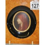 A fine miniature portrait in a walnut frame.
