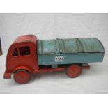 A large 1950/60's pressed steel garbage truck by Leeway (back tyre missing).