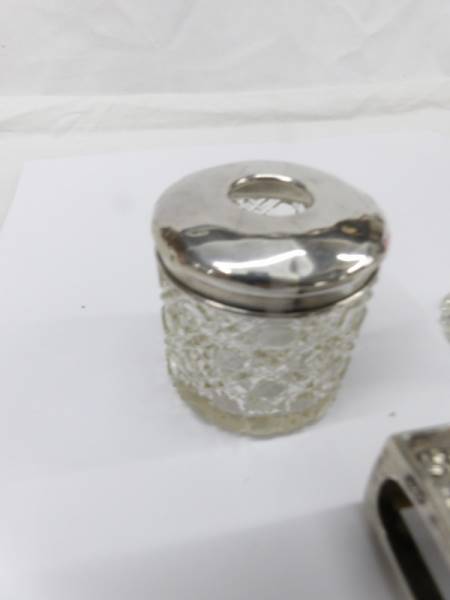 A silver topped hair pot, a scent bottle and a matchbox holder. - Image 4 of 4