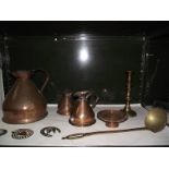 A mixed lot of brass and copper including graduated jugs.