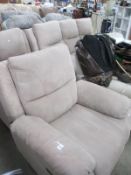 A pair of reclining arm chairs and a three seater