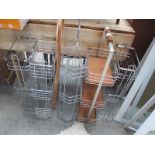 5 kitchen racks and a carpet beater