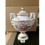 A large signed Dresden two handled porcelain vase with lid.