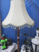 A standard lamp and shade