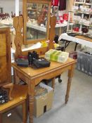 A solid pine mirror back dressing table, (collect only).