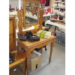 A solid pine mirror back dressing table, (collect only).