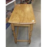 A polished light oak hall/ side table, (collect only).