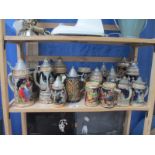 A collecion of approximately 18 German tankards / Steins